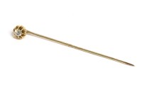 Lot 54 - A late Victorian gold single stone diamond stick pin
