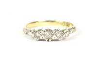Lot 67 - An 18ct gold three stone diamond ring