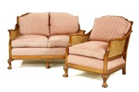 Lot 321 - An early 20th century Bergere sofa and armchair