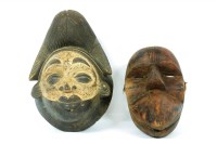 Lot 177 - Two African curved masks