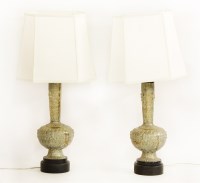 Lot 265 - A pair of Indian cast gilt metal table lamps