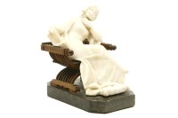 Lot 161 - An early 20th century carved alabaster figure of a seated woman