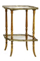 Lot 392 - A shaped two tiered burr maple table