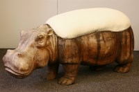 Lot 255 - A carved hippo ottoman