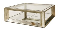 Lot 442 - A low silver-painted and mirror-inset coffee table