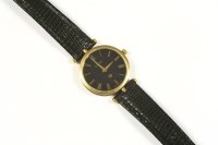 Lot 85A - A gentlemen's gold plated Gucci quartz strap watch
