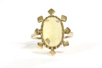 Lot 82A - A 9ct gold single stone oval cheque cut citrine ring