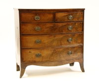 Lot 549 - A George III mahogany bow fronted chest of two short above three long drawers