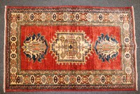 Lot 450 - A small hand knotted Persian rug