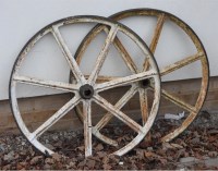 Lot 602 - Two horse cart wheels with seven spokes