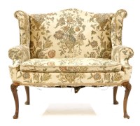Lot 424 - A Queen Anne style walnut two seater settee