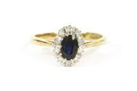 Lot 10 - A 9ct gold sapphire and diamond cluster ring