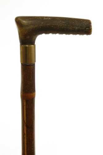 Lot 203 - A timber merchant's cane