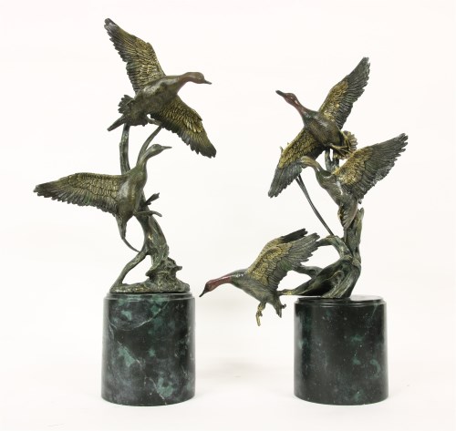 Lot 296 - A pair of contemporary figures of ducks in flight