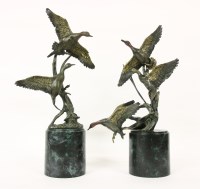 Lot 296A - A pair of contemporary figures of ducks in flight