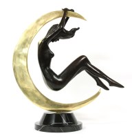 Lot 325 - An Art Deco style bronze figure of a nude in a crescent moon