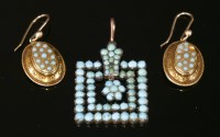 Lot 651 - A silver gilt square turquoise set pendant