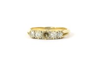Lot 7 - A gold five stone diamond ring