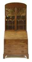 Lot 401 - A George III mahogany bureau bookcase