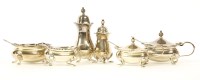 Lot 138 - Two silver condiment sets
