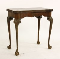 Lot 592 - A George II style mahogany fold over card table