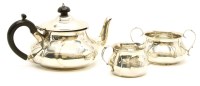 Lot 119 - A silver three piece bachelor tea set
