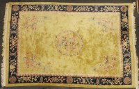 Lot 538A - A large Chinese cut pile yellow ground carpet