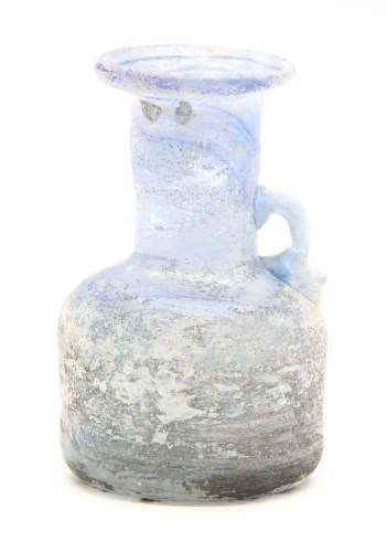 Lot 46 - A Roman blue glass handled jug