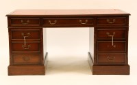 Lot 564A - A reproduction mahogany nine drawer twin pedestal desk