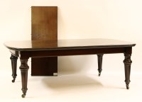 Lot 411 - A large Victorian mahogany wind out dining table