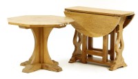 Lot 425 - A miniature oak gateleg table
