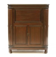 Lot 379 - A 20th century eastern hardwood drinks cabinet