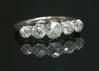 Lot 42 - A graduated five stone diamond ring with old European cut diamonds