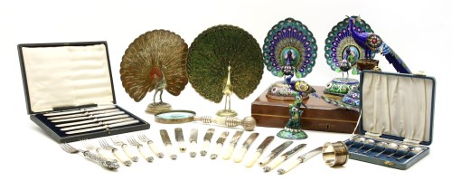 Lot 195 - A quantity of eastern white metal and enamel peacock figures