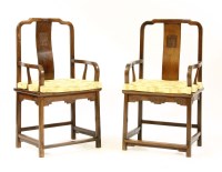 Lot 422 - A pair of early 20th century Chinese Zitan open armchairs