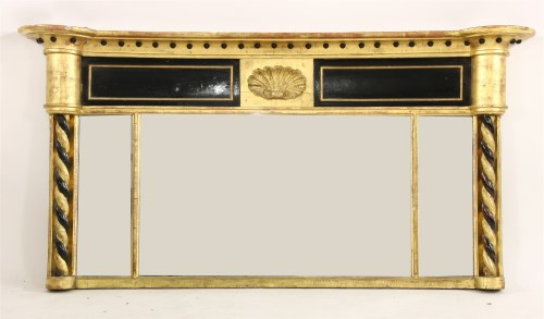 Lot 486 - A Regency gilt and ebonised overmantel mirror