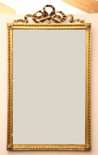 Lot 491 - A Louis XVI style gilt wall mirror
