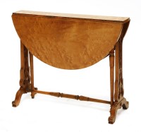 Lot 556 - A Victorian bird's-eye maple Sutherland table