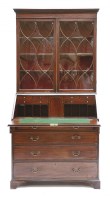 Lot 517 - A George III strung mahogany bureau bookcase