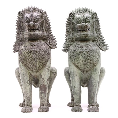 Lot 324 - A pair of Indian seated lions 

Provenance: From the estate of the late Henry Wilson