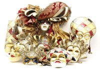 Lot 275 - A collection of papier mache leather and ceramic theatrical masks