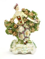 Lot 410 - A Derby seated figure of an elegant lady