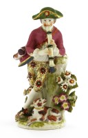 Lot 86 - A Bow figure of a flute player