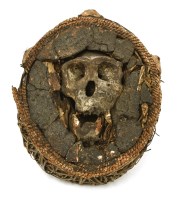 Lot 283 - A Vili Nkisi fetish chimpanzee skull