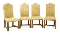 Lot 508 - A set of twelve contemporary oak and upholstered high backed dining chairs