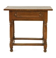 Lot 527 - A Continental walnut side table