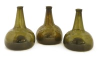 Lot 405 - A group of three Dutch horse hoof wine bottles