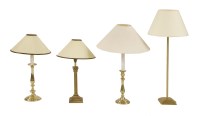 Lot 556 - Four various brass table lamps