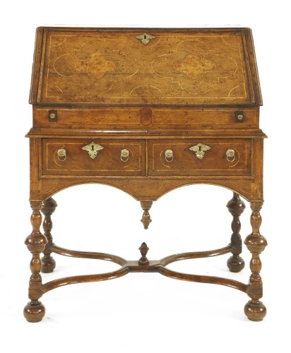 Lot 564 - A Queen Anne strung and inlaid oak bureau on stand