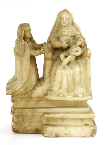 Lot 562 - An alabaster figure of the Virgin and Child